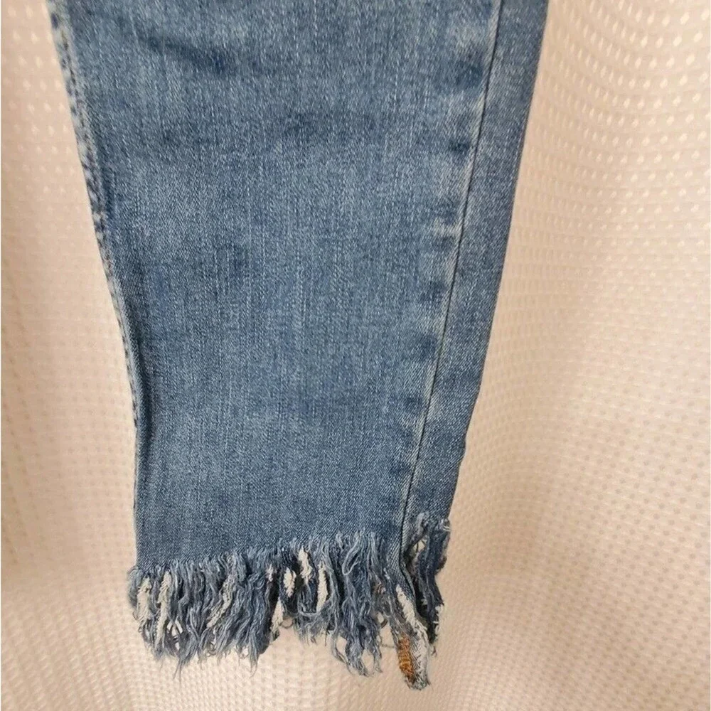 Free People light wash distressed diagonal raw‎ hem jeans size 30 new!!!